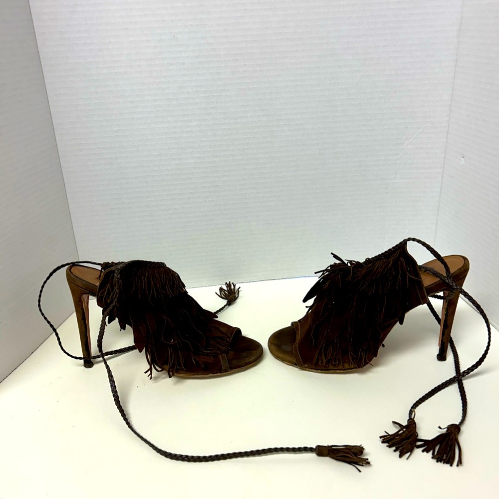 Aquazzura fringed brown suede heels.